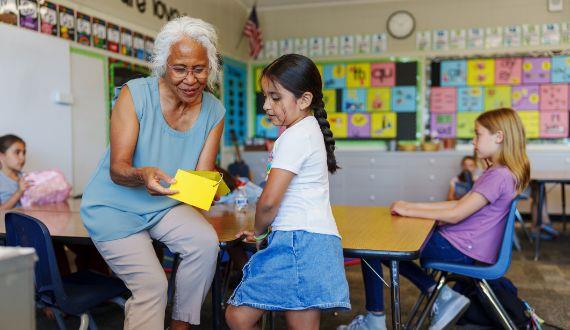 Older senior lady and student